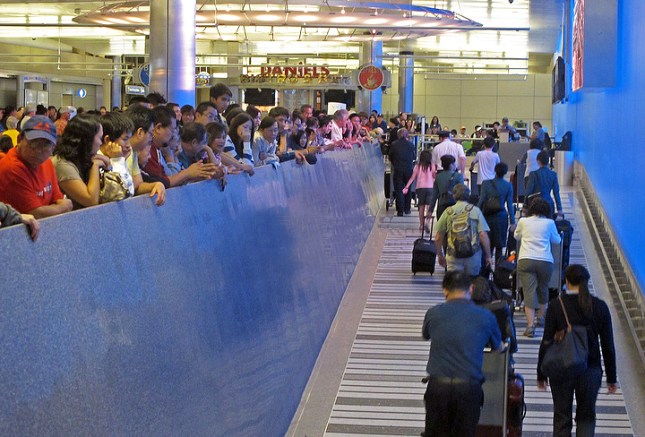 People in the LAX arrival lobby. (Photo by Ringo H.W. Chiu)